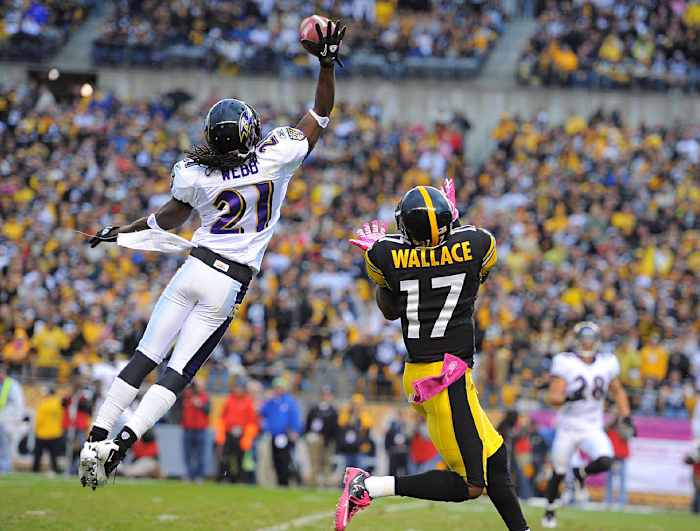 Lardarius Webb breaks up a pass to Mike Wallace, October 2010.